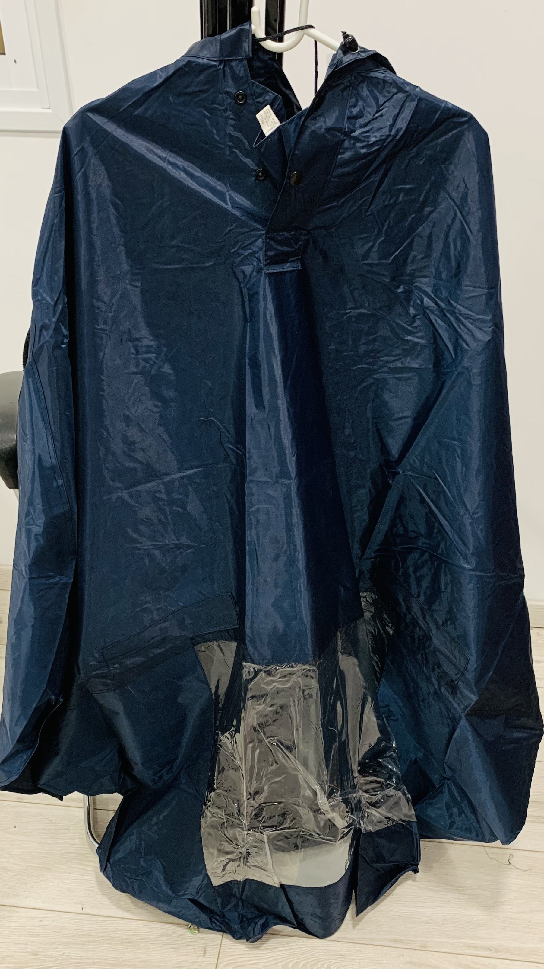 מעיל גשם לאופנוען, לכיסוי האופנוען וגם האופנוע.